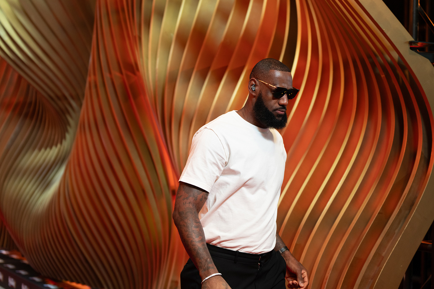 Fashion  runway parametric installation fashion show NBA sports gold slats contours