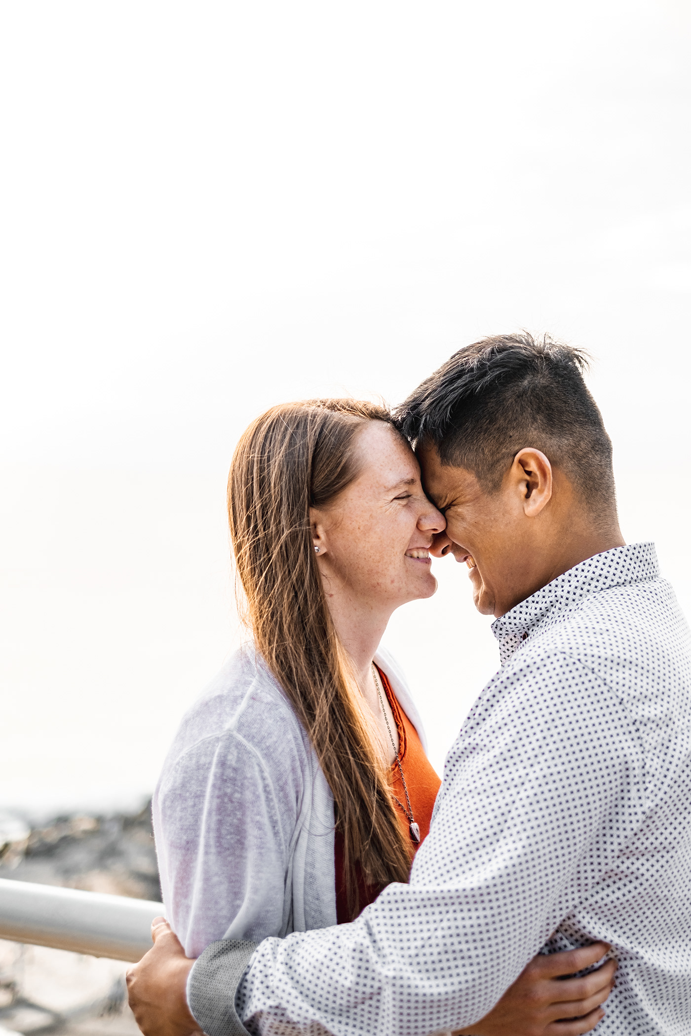 Photography  engagement Ocean Candids Natural lighting couple Love