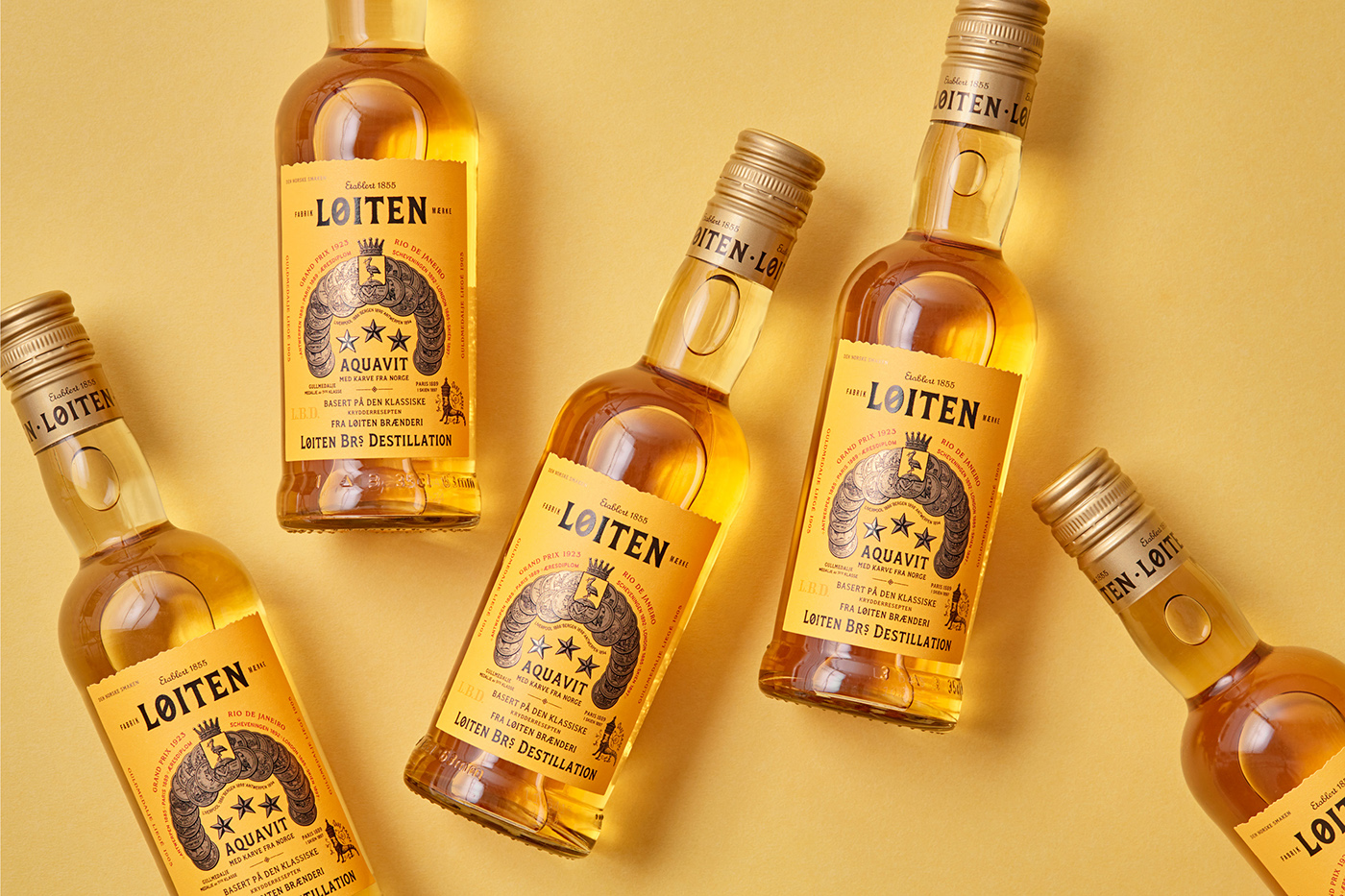 løitens aquavit redesign yellow destillery Since 1855