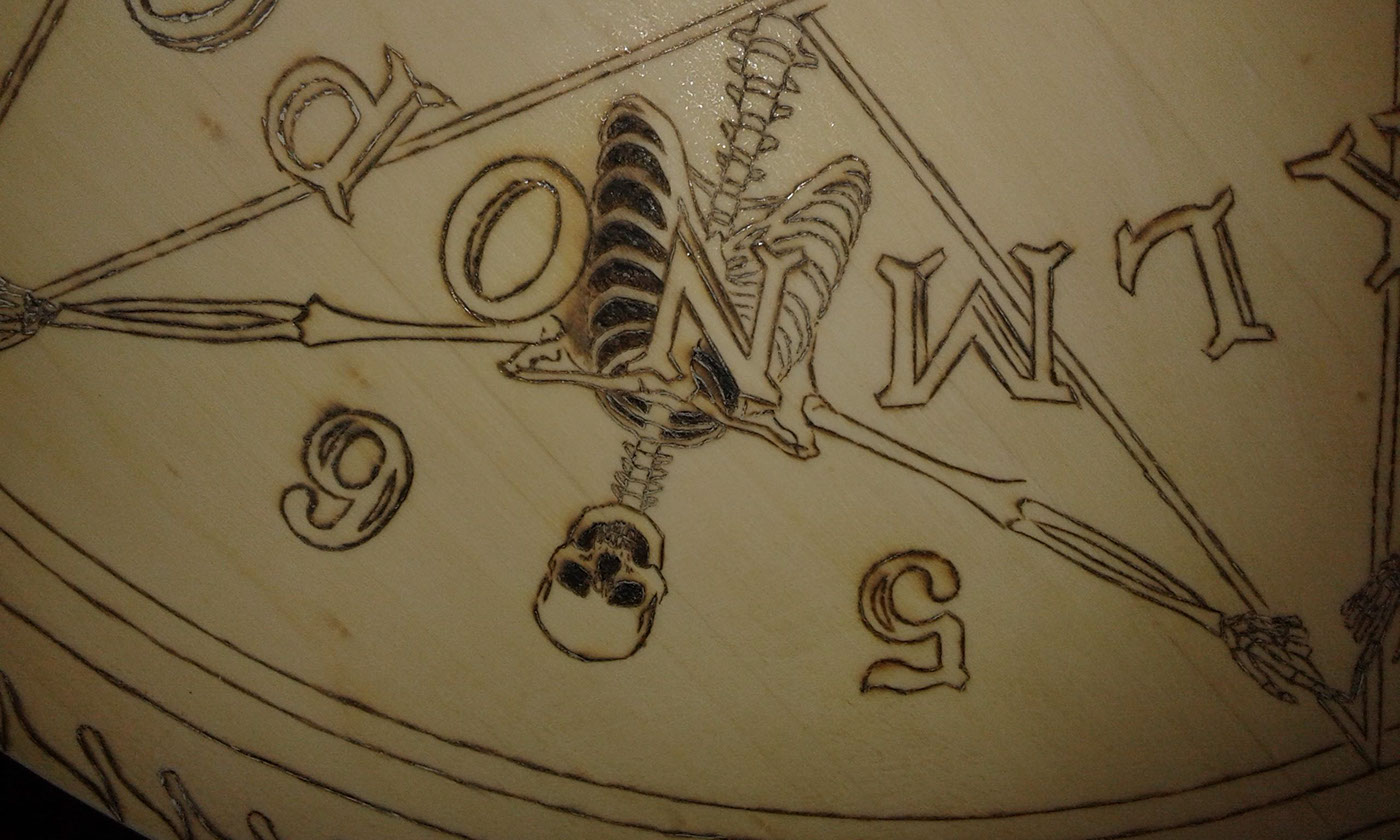 ouija Board evil Spirits Pyro pyrography skeletons skulls lettering carving