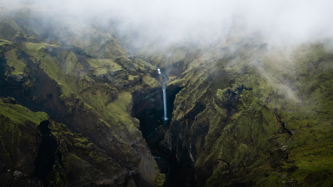 Aerial Landscape iceland mountains fog Moody clouds river drone Highlands
