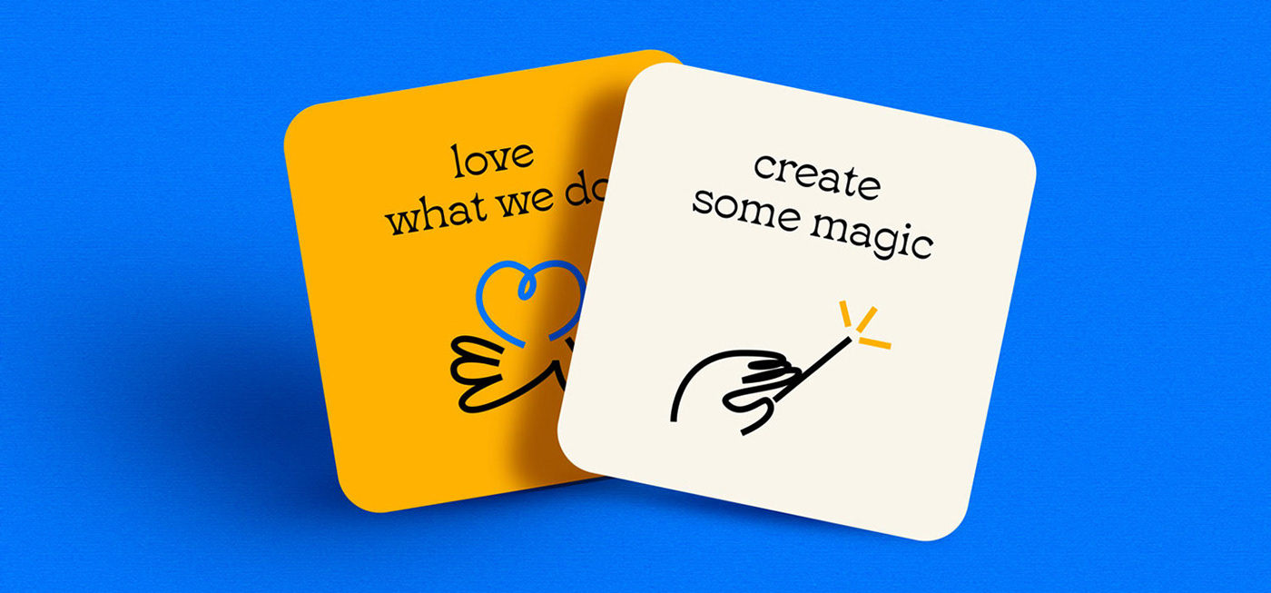 Cards with illustrations of a hand with a wand, a hand with a heart, custom-made for a brand.