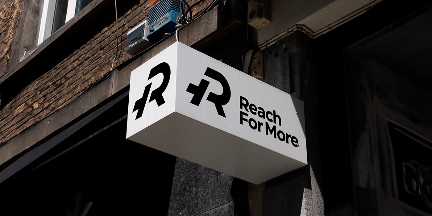 Reach For More outdoor sign with logo