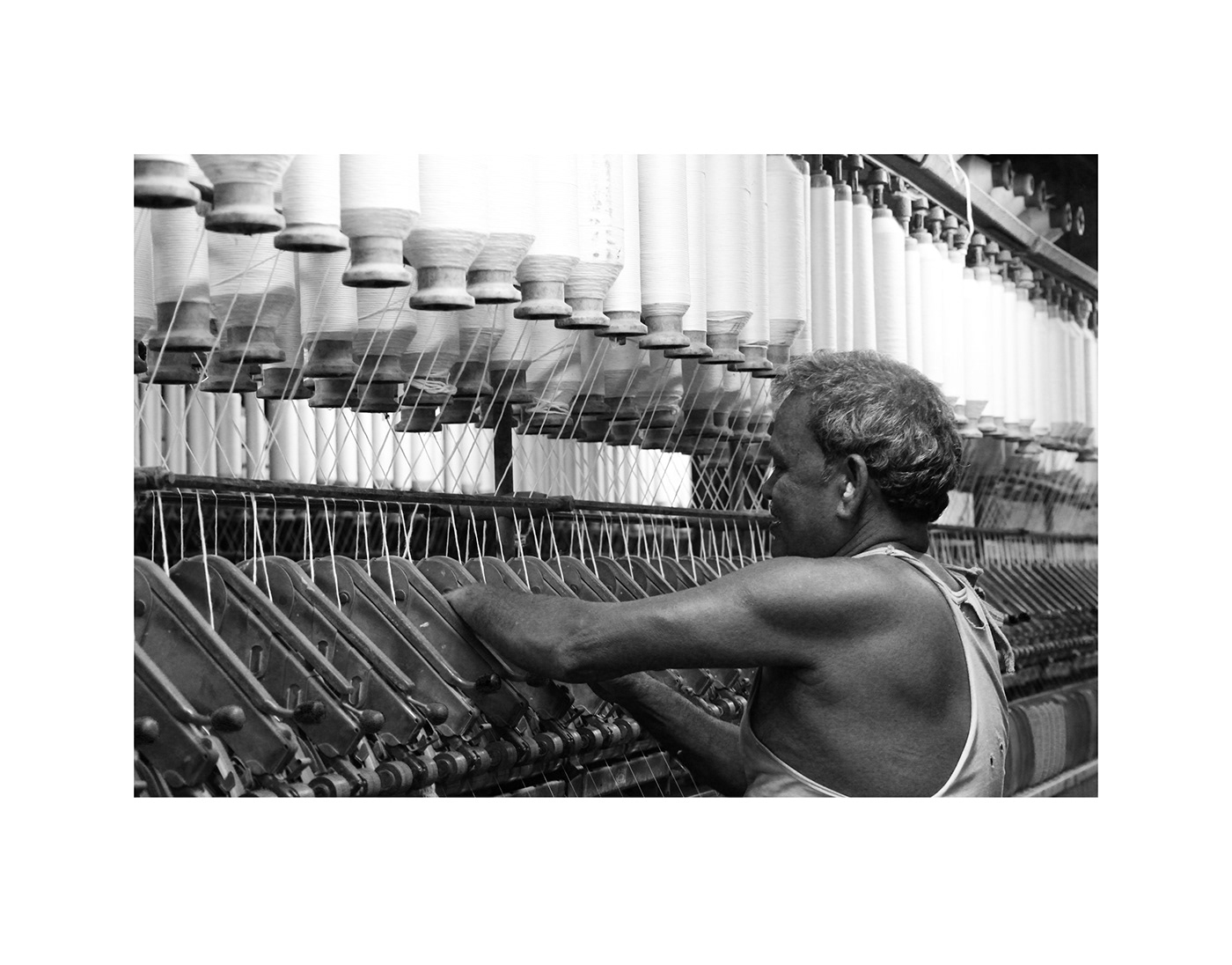 art blackandwhite clothmaker cotton makingofindia mill worker Perspective Photography  skillworker thread