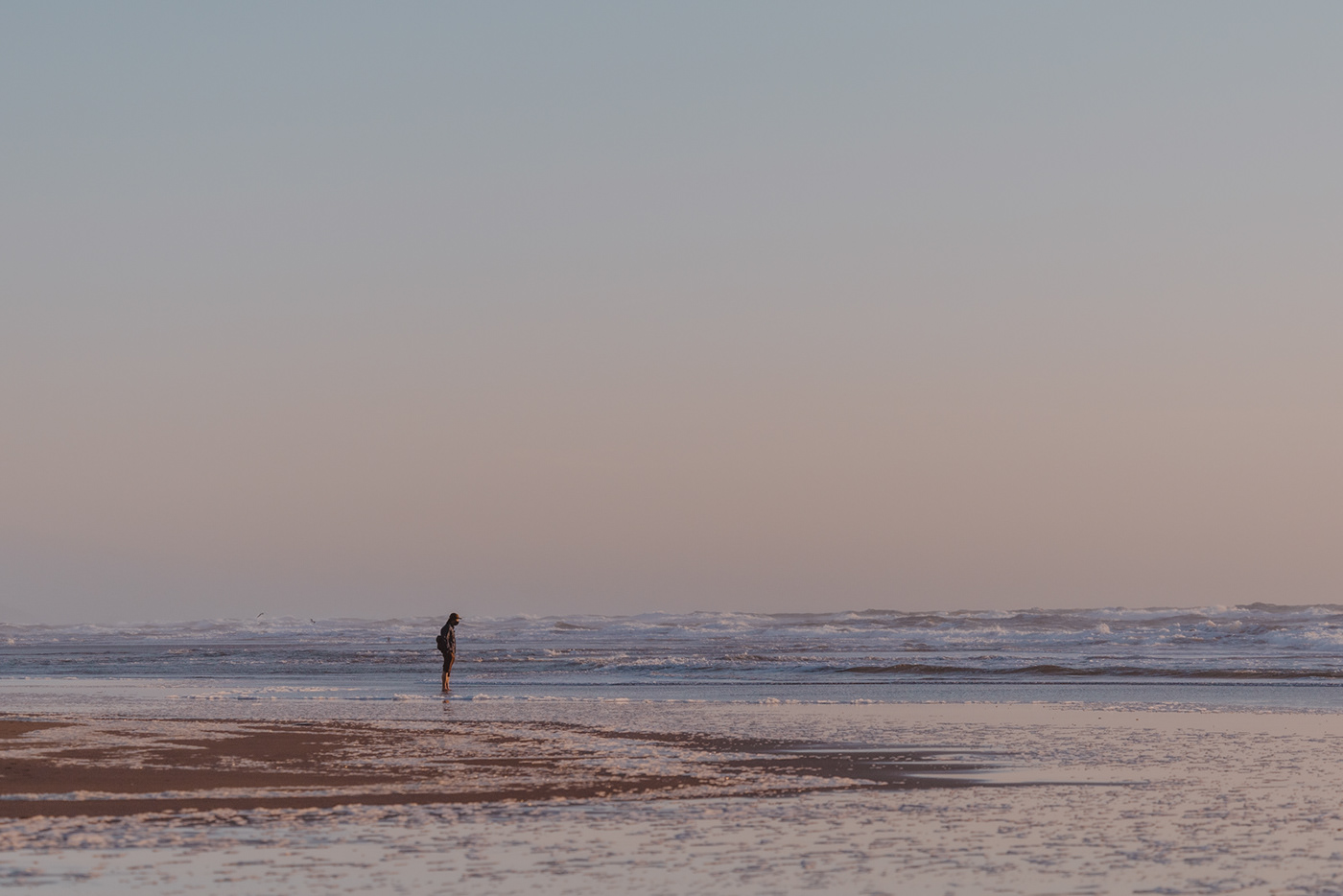Man walking in the beach (Ocean beach, California) by Kathy Gomez Photography