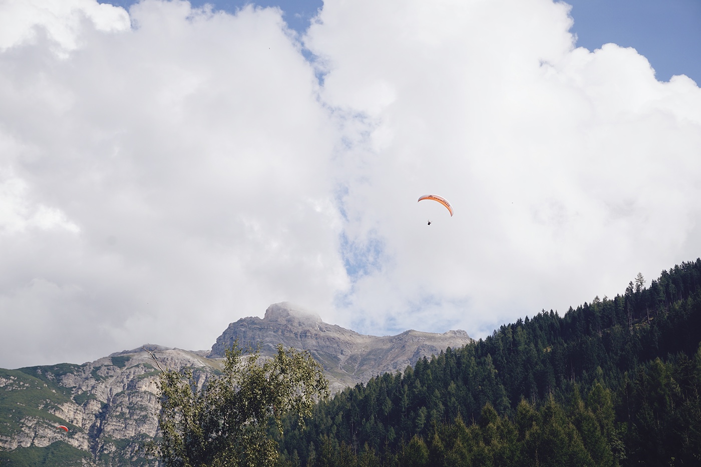 Travel wanderlust innsbruck austria tyrol paragliding alps mountains summer Europe