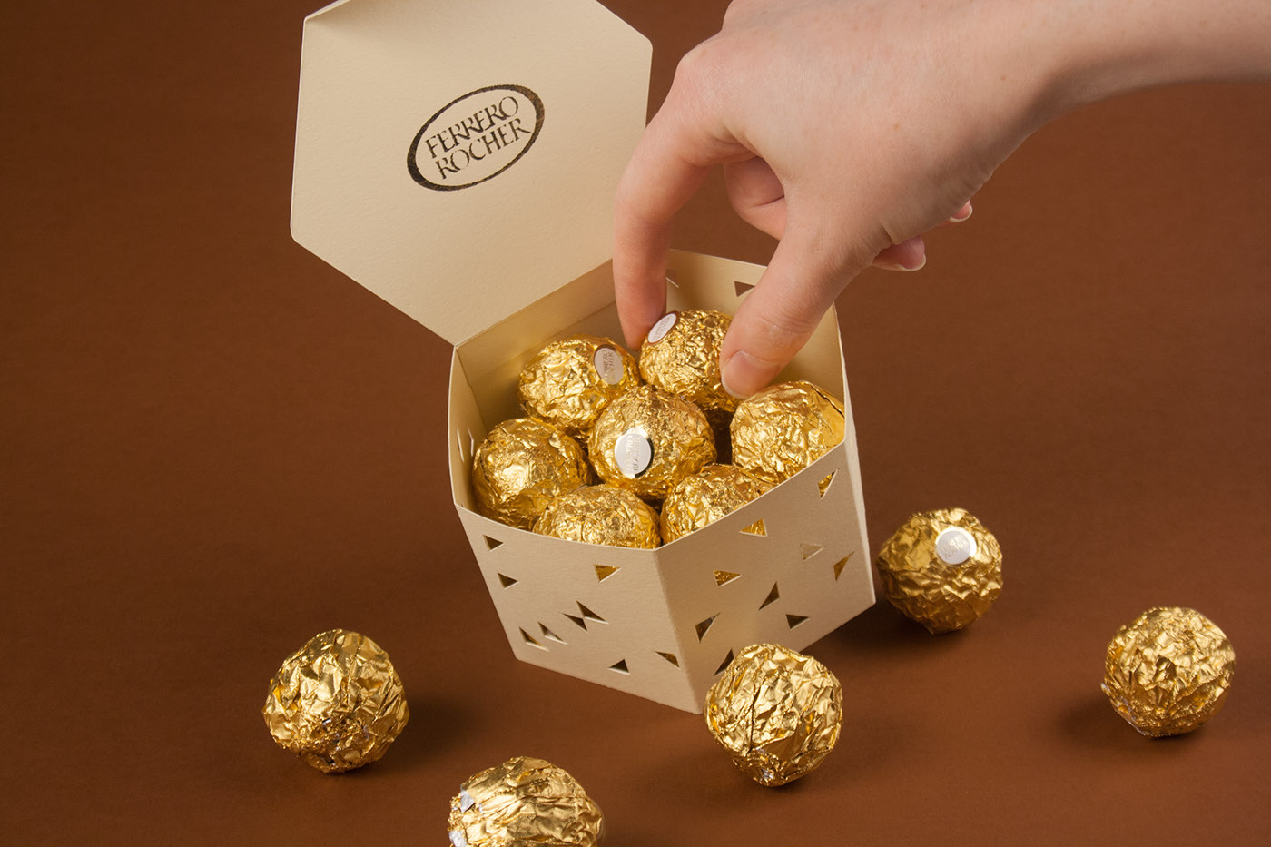 ferrero rocher Sustainability environmentally friendly cream gold foil foiling responsible design chocolate nutella hexagon
