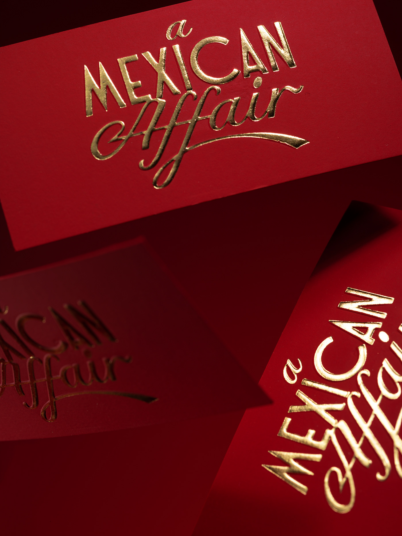 Extreme close up of floating business cards for A Mexican Affair