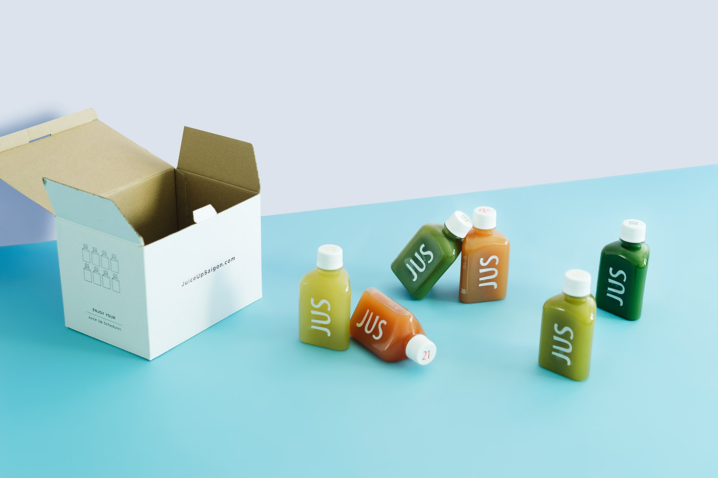 Cold Pressed Juice branding  visual identity jus juice up saigon Packaging triangle bottle A Design Award m-n associates m-n