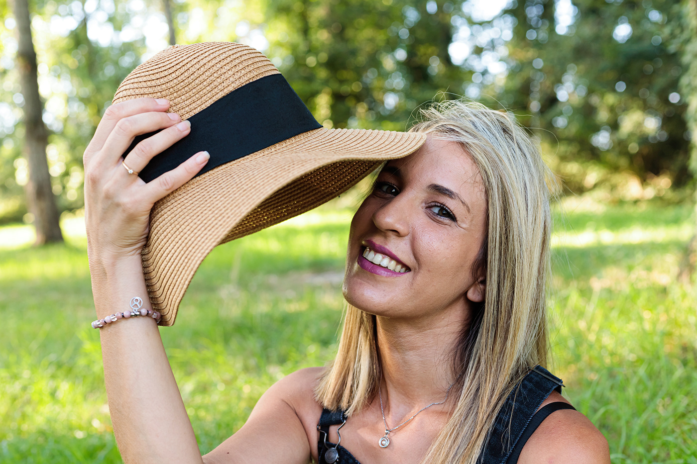blonde Blue Eyes country hat outside portrait prairie smiling woman young woman