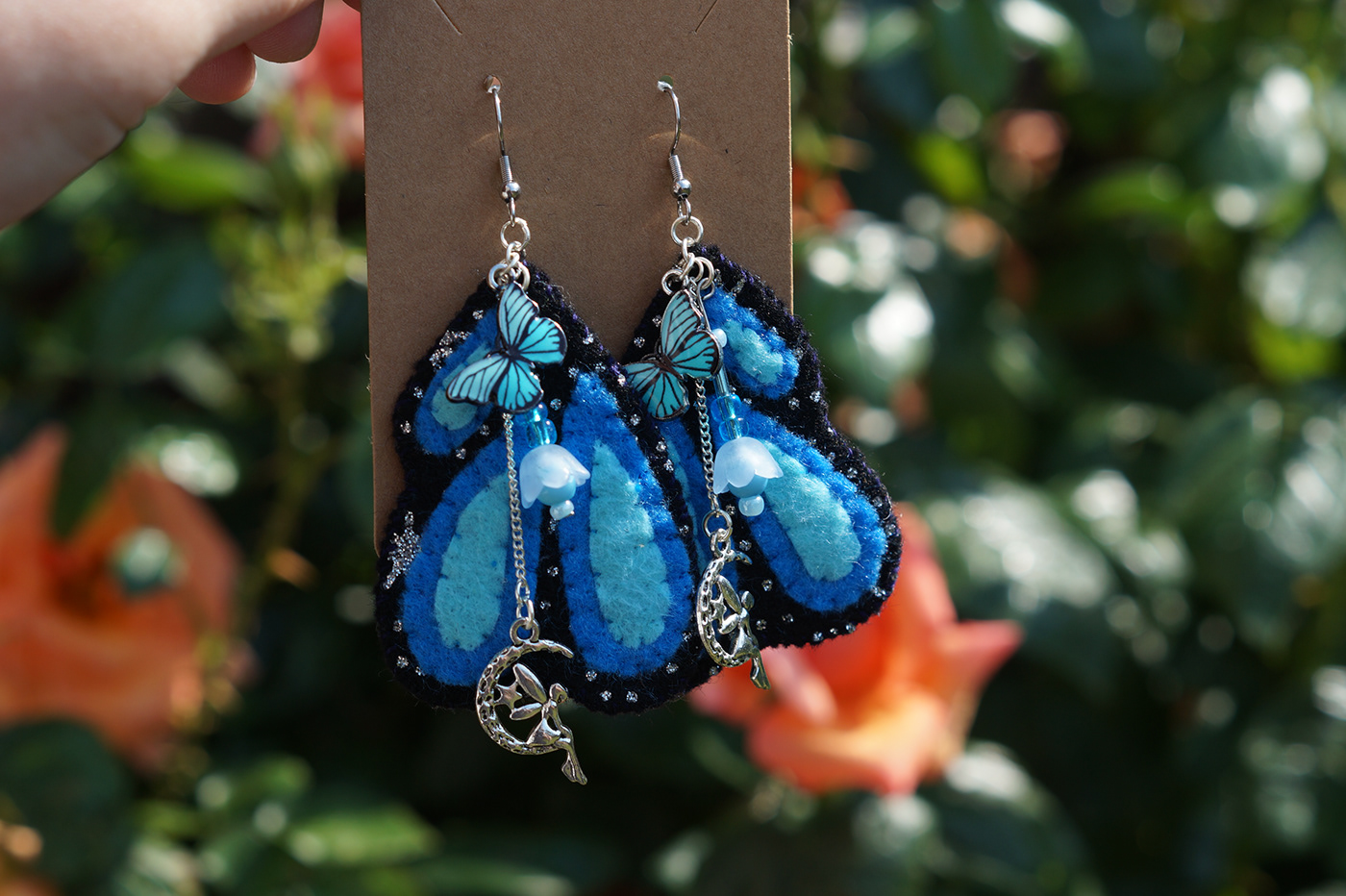 hand stitched felt butterfly earrings with metal fairy charms