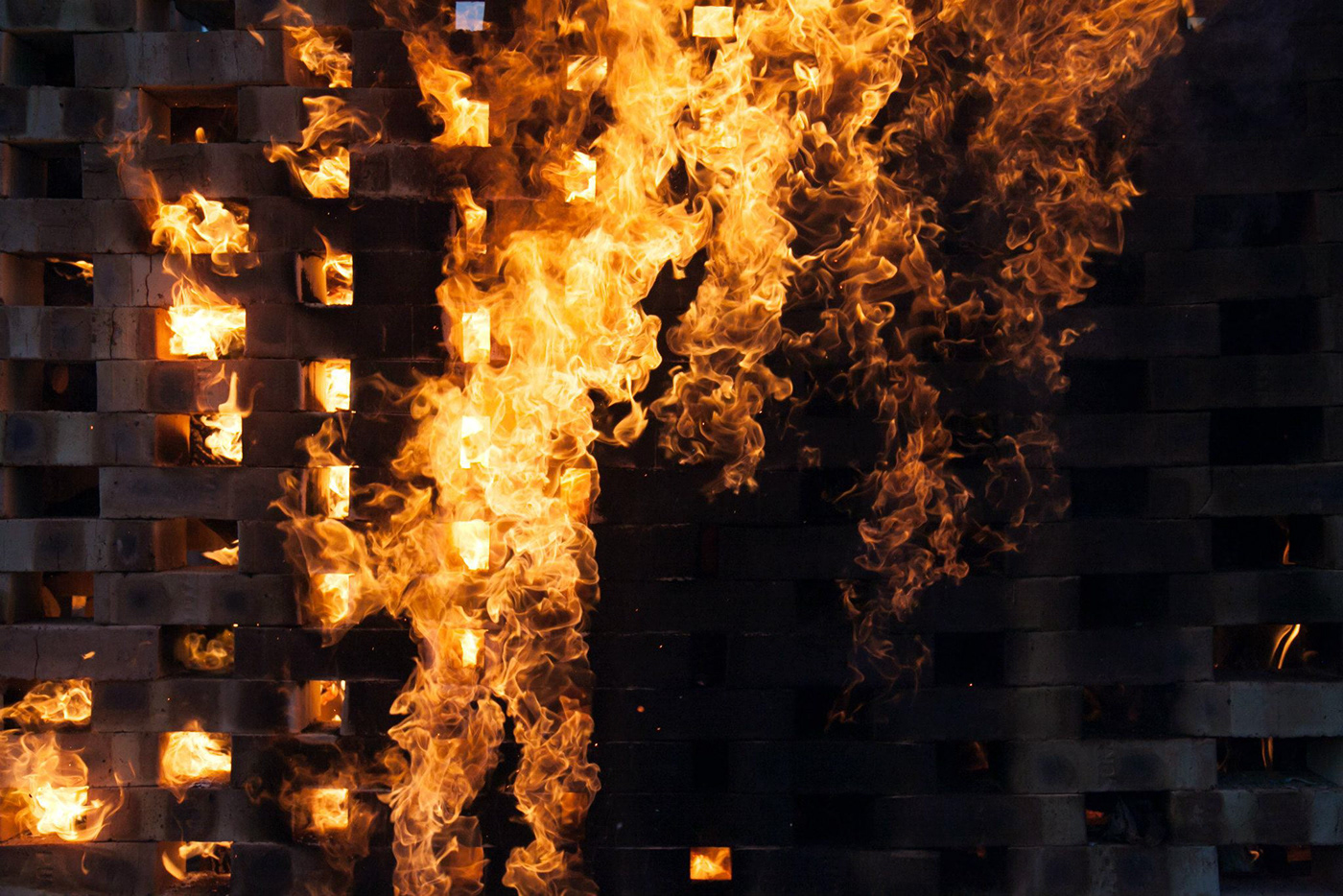 sculpture installation fire burning brick temporary festival
