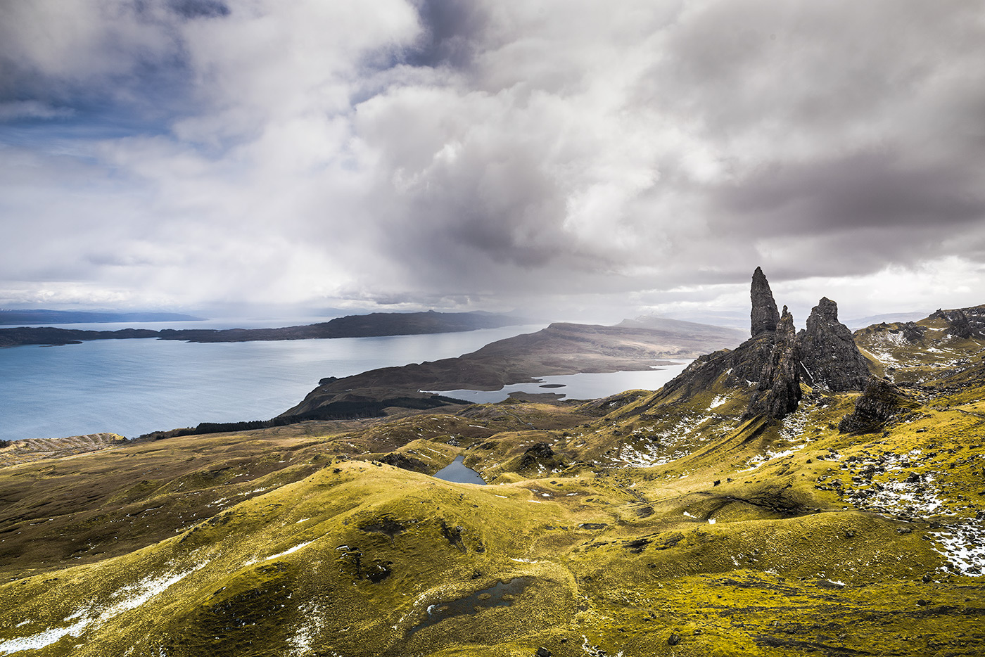 Dramatic landscape photography of the Old Man of Storr by Jennifer Esseiva.