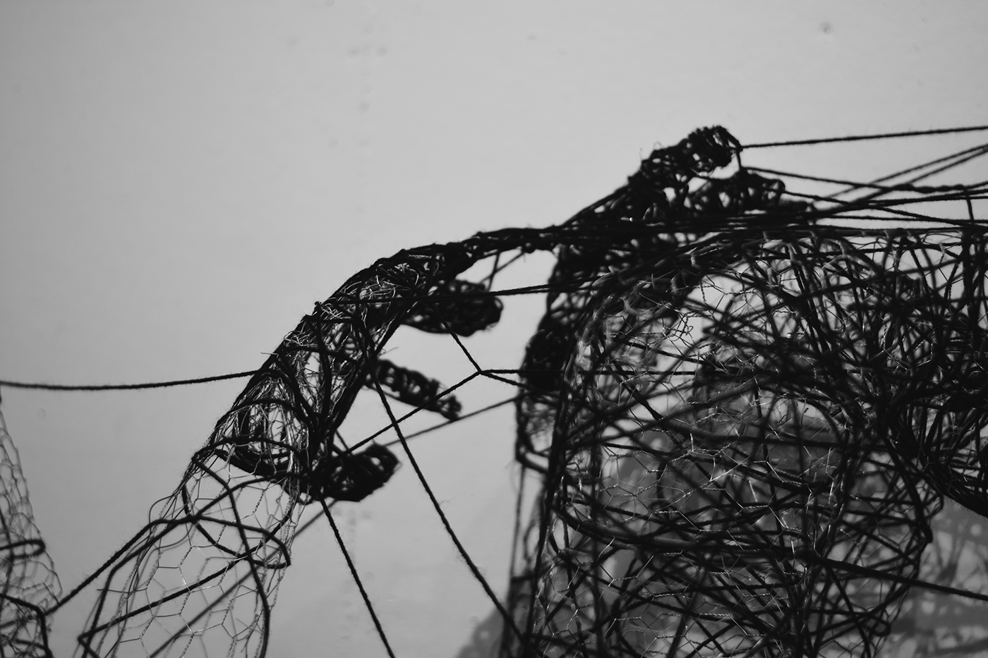 wire yarn figure sculpture installation