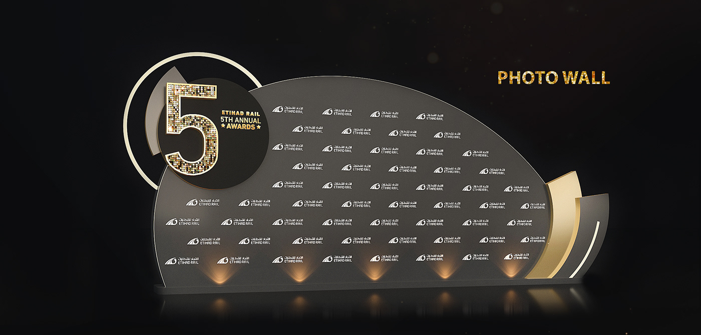 Annual Awards corporate Etihad Rails Event gold media wall Photowall registration counter Sigange Stage