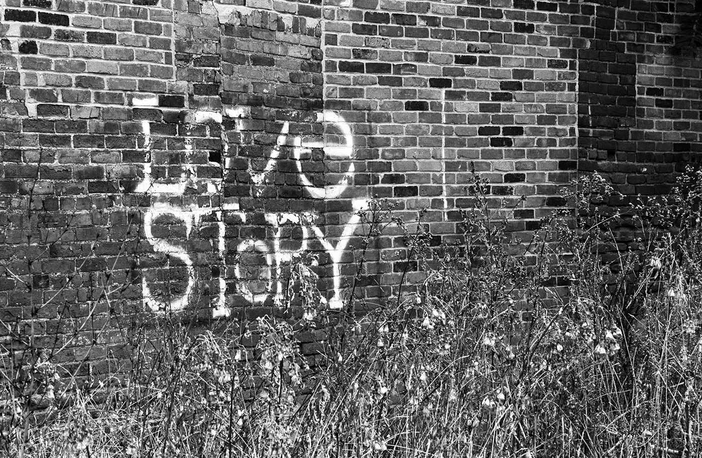 "Love Story" painted on a wall in Detroit, Michigan.
