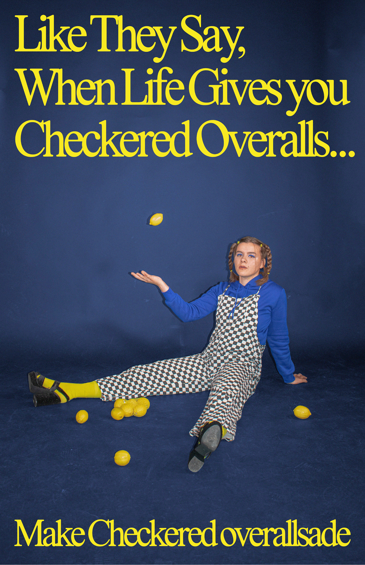 when life gives you checkered overalls... a photo of a girl in a studio with a blue background.