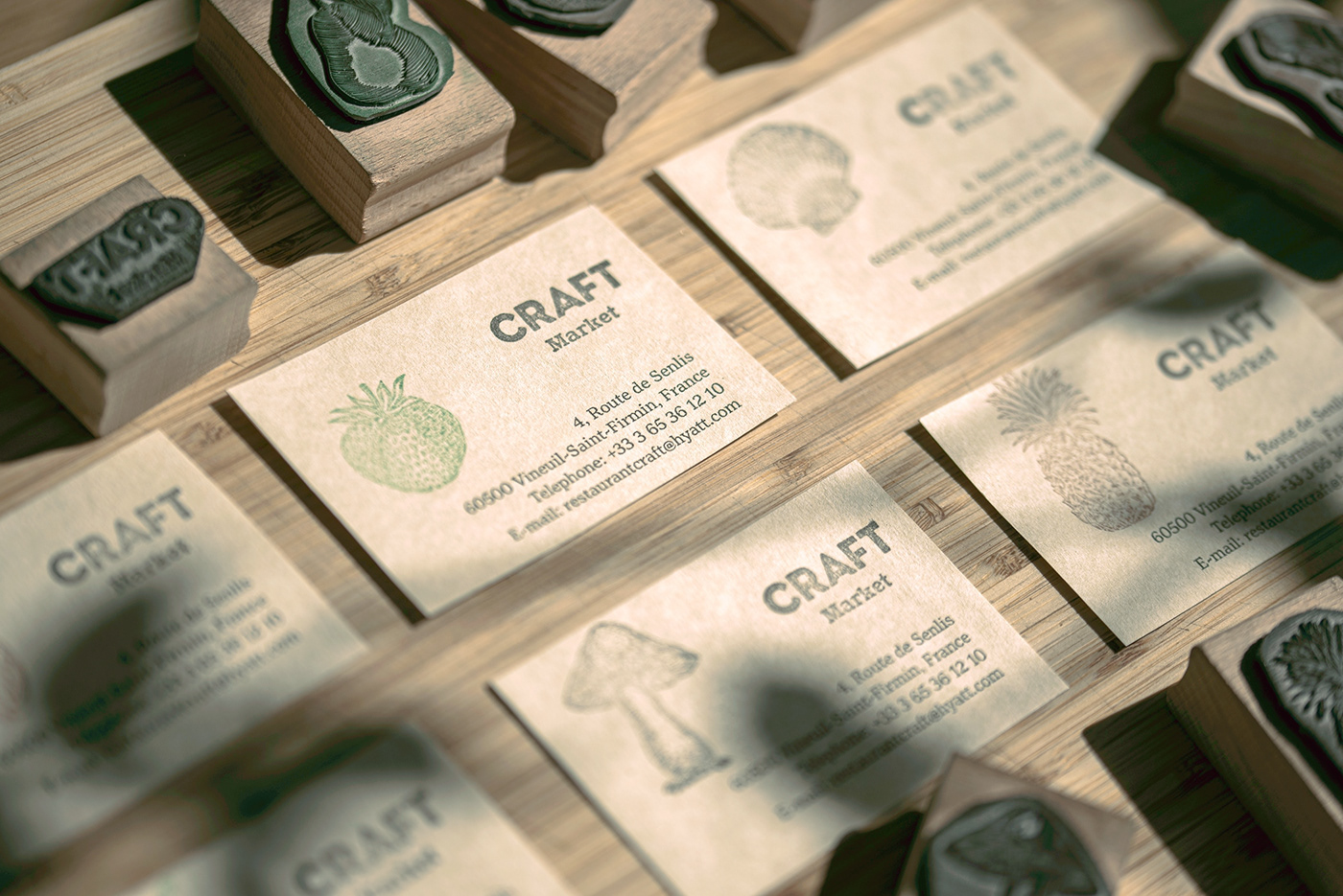 Closeup of CRAFT Market cards, including several rubber stamps with food ingredients on.