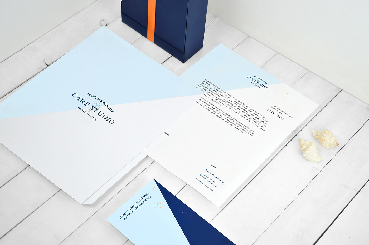 Ocean house water wood White blue orange beach shell stationary logo Icon vacation agency