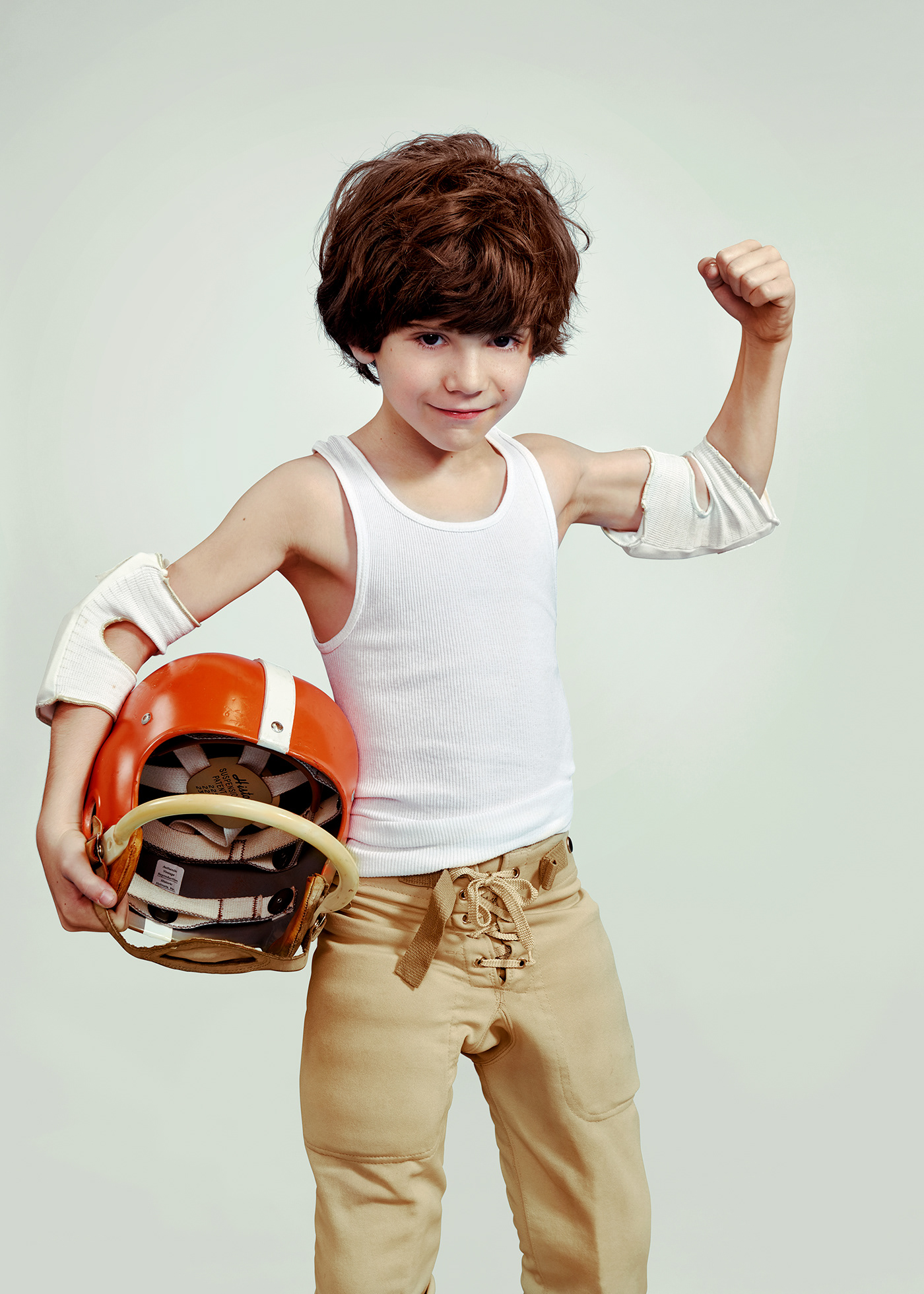 football norman rockwell Character sports youth photo series Elevated underdog boy athlete