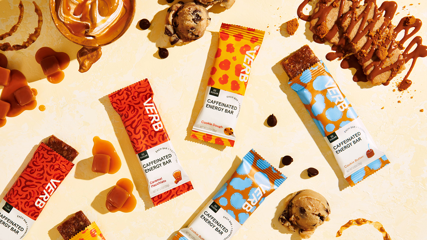 energy bar collection paired with dessert flavor cues on yellow surface