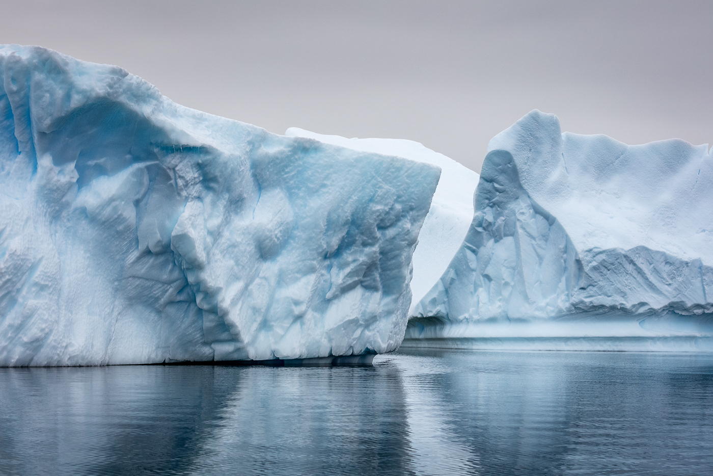 ice iceberg antarctica Isostacy calm cold reflections water Ocean blue