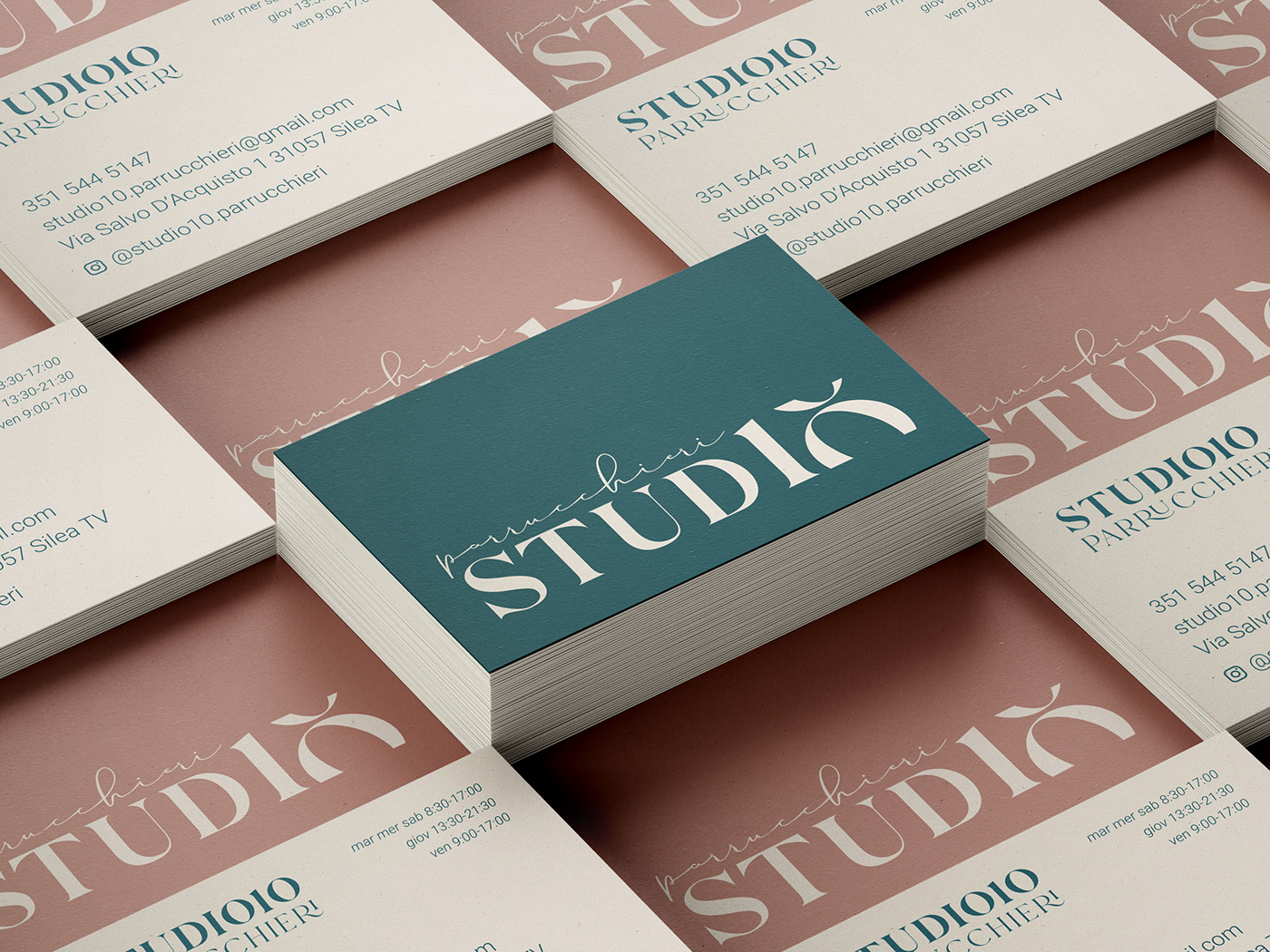 Pink and teal stacked business cards mockup on recycled paper