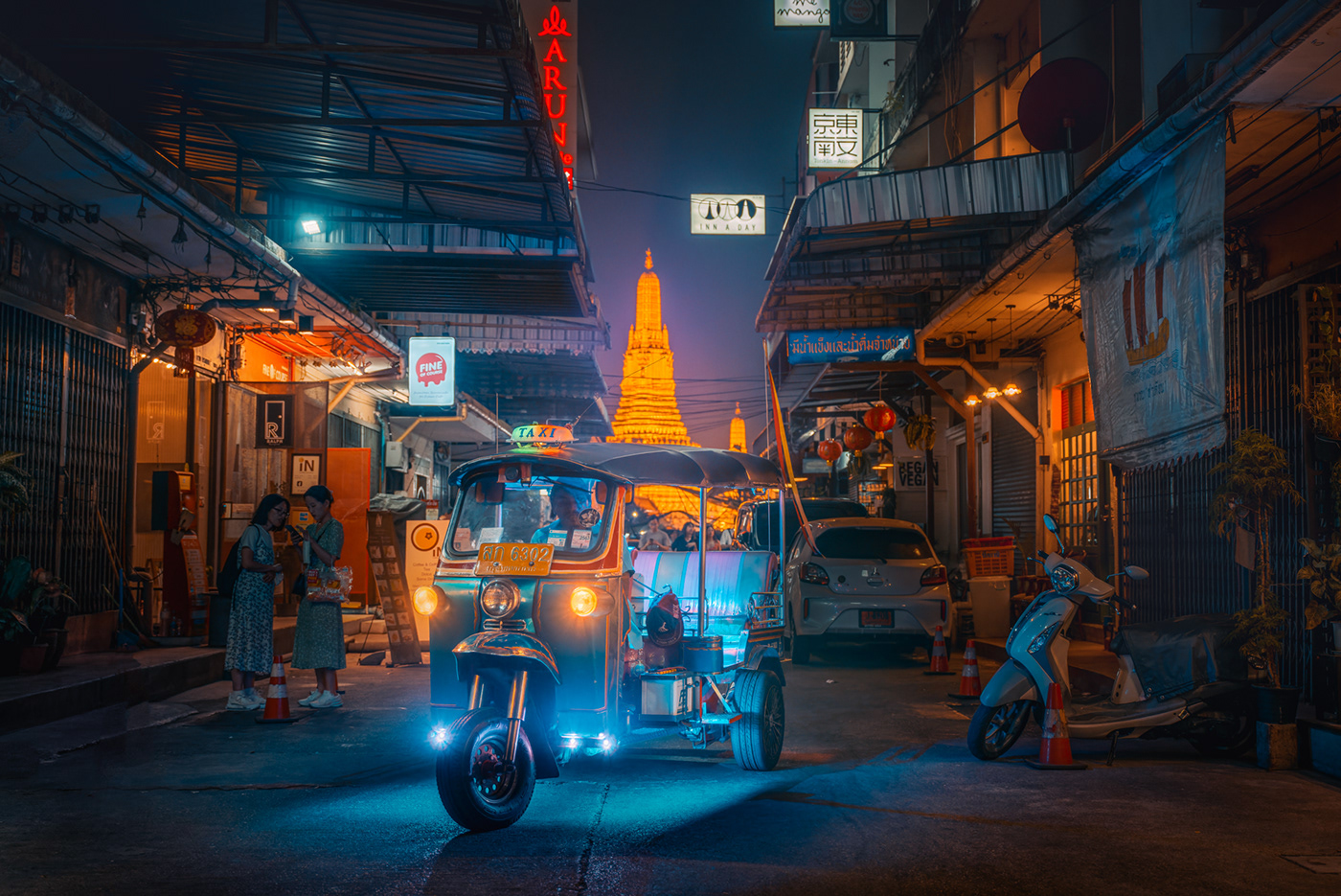 Bangkok neon neon lights night orange and teal Street
