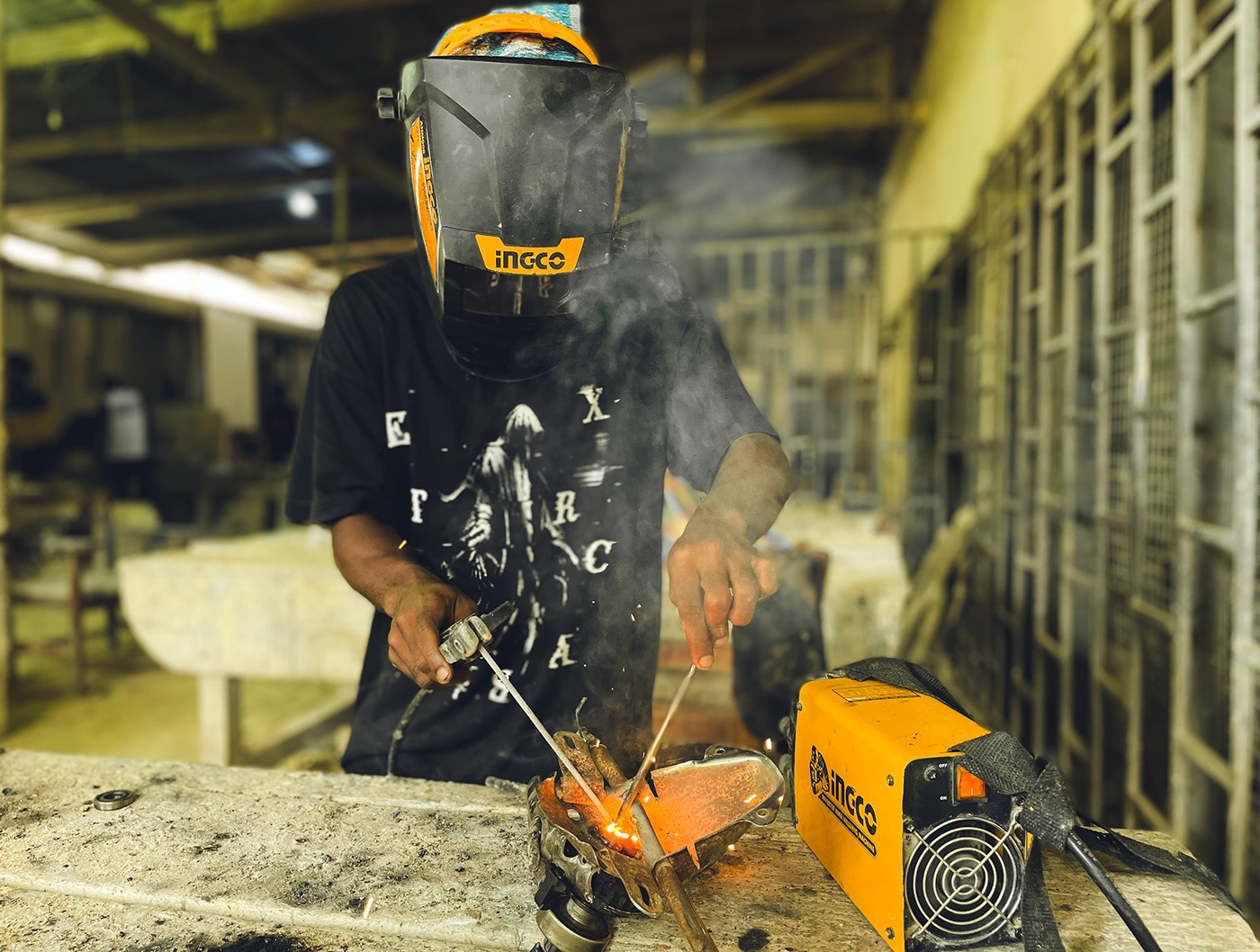 welding Welding Art Workers photo documentary iPhone photography Ghana Helmet