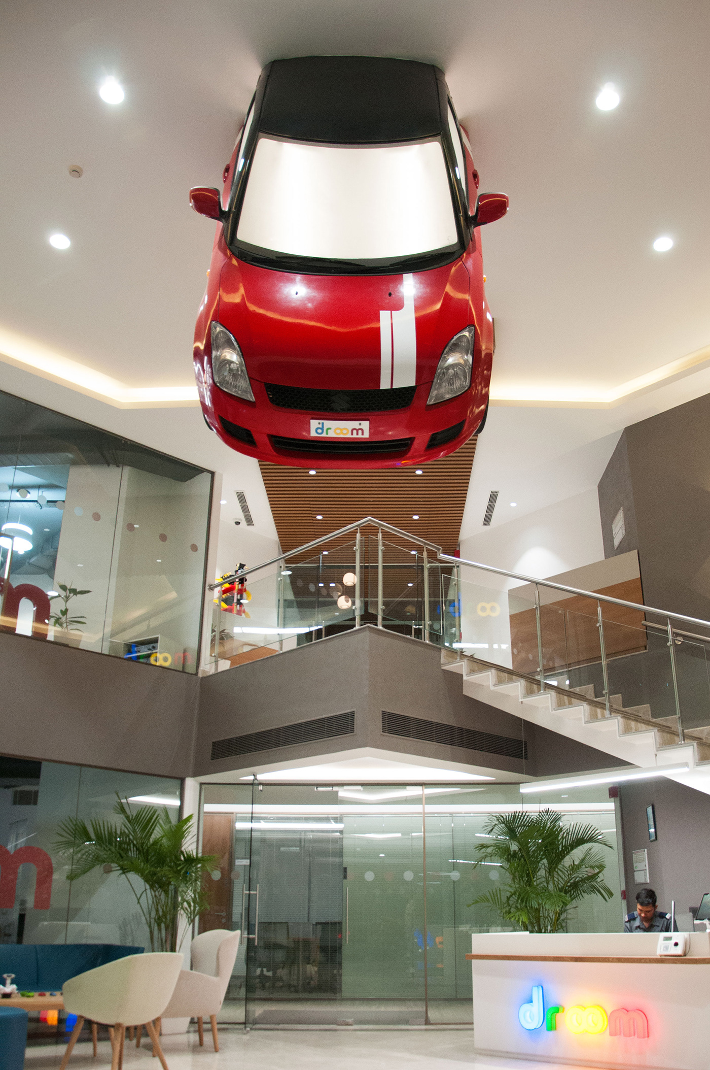 hanging car out of roof droom Alloverdesign automobile art corporate interiors Cars Project interiors installations