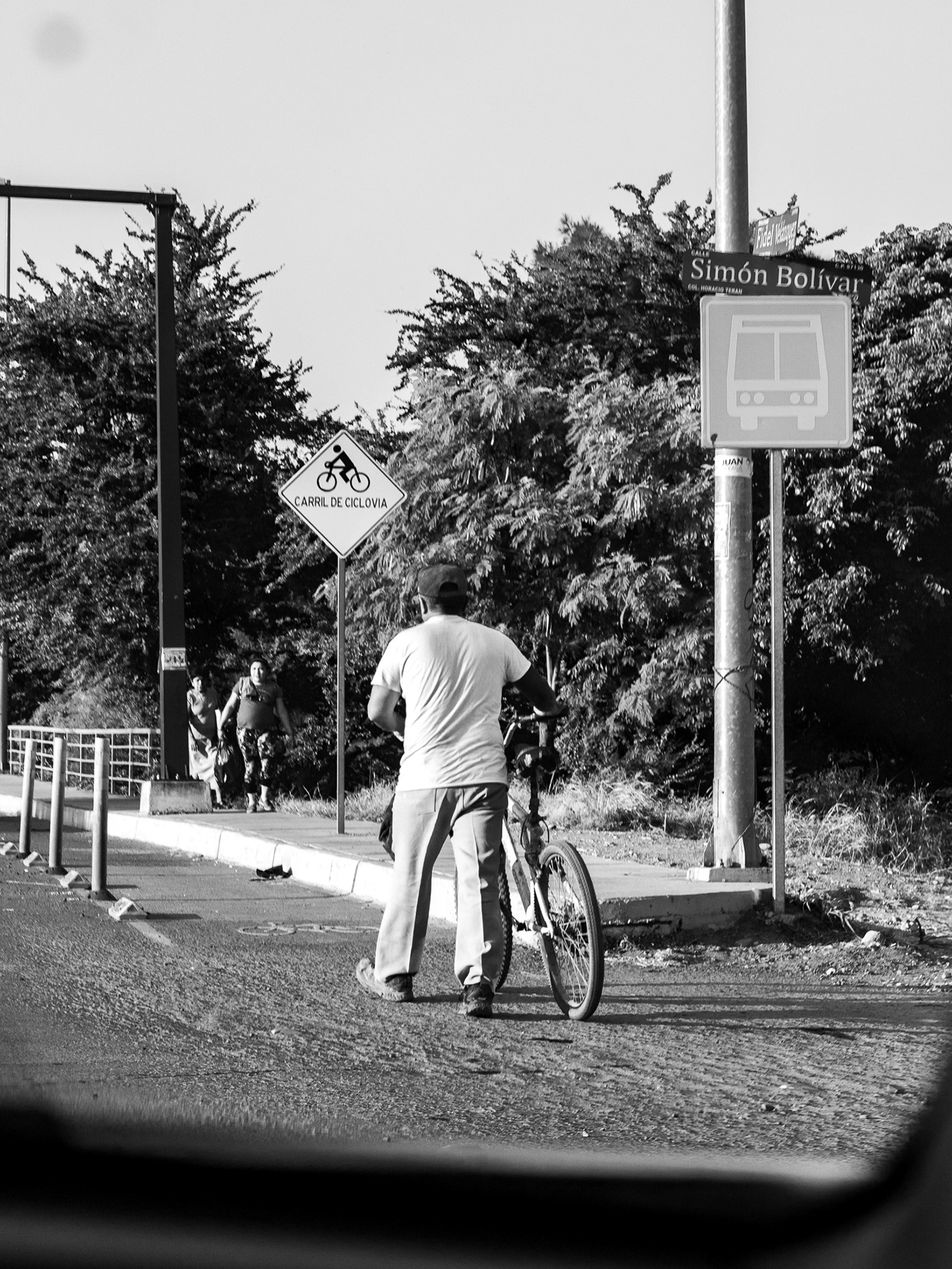 black and white bycicle Passersby street photography transient Workers working