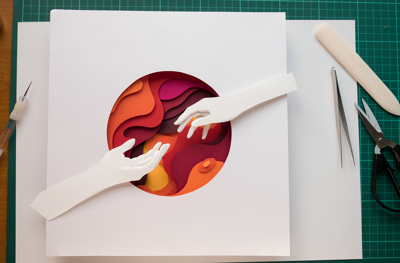 podcast cover design kind world hands 3D paper art paper cut paper dimensional paper sculpture