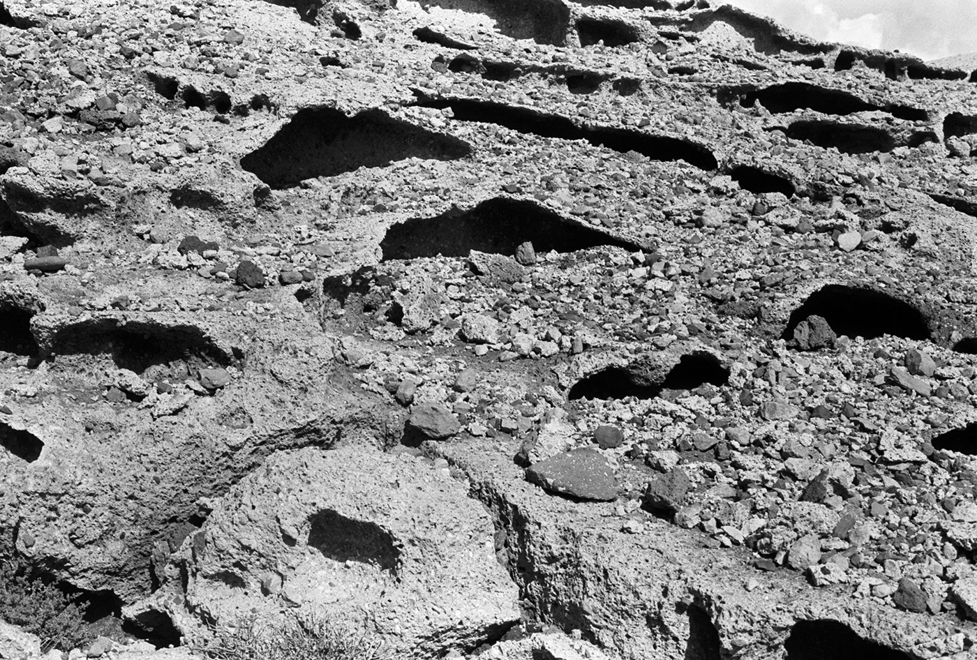 Black and white close-up photograph of the pumice stone rocks on the rock face at Tajao, Tenerife.