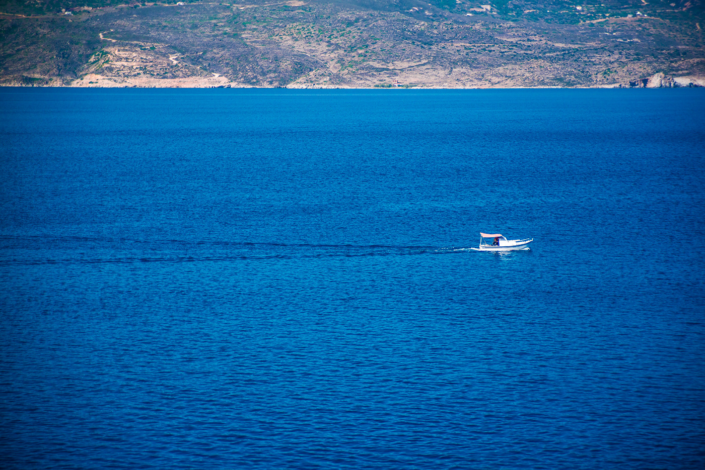 milos Greece vacation sea Island relax vivid colors people sunset Travel