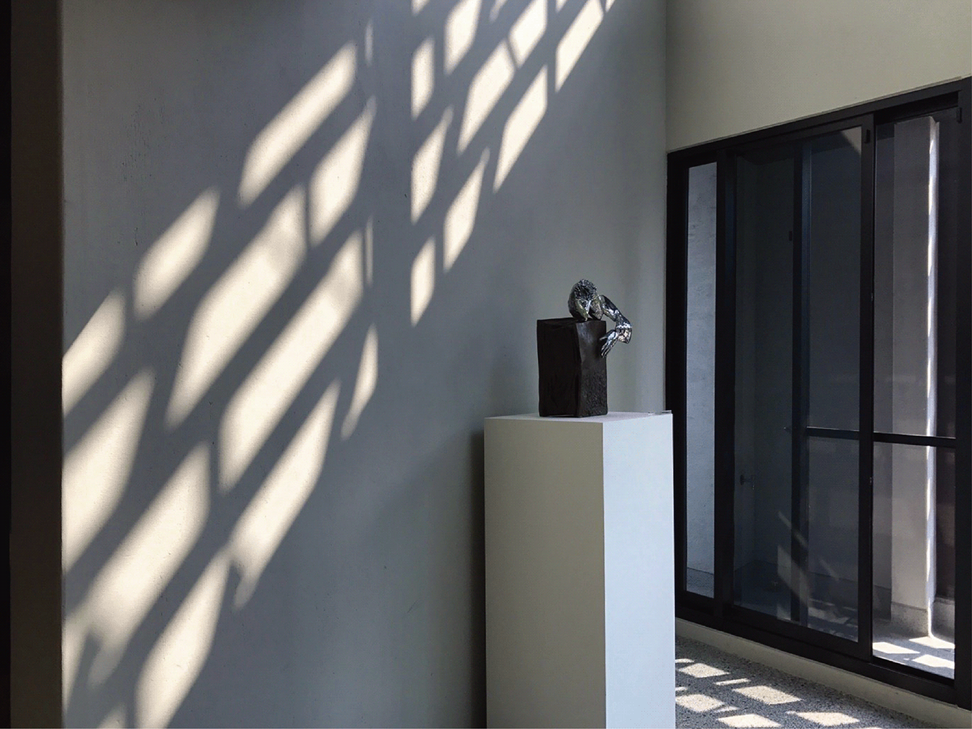 Image may contain: wall, indoor and shadow