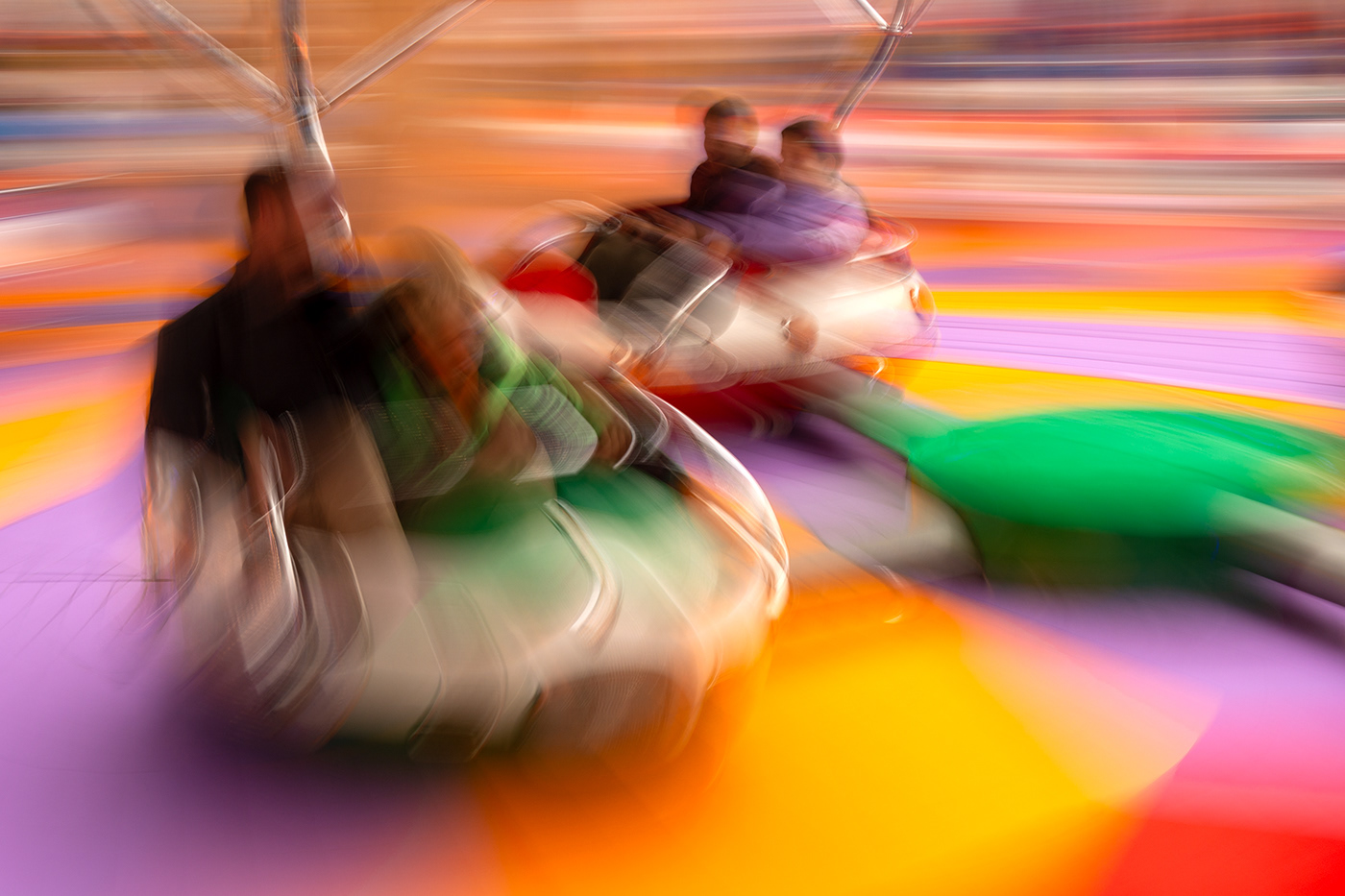 amusement ride people colorful ICM Basel Switzerland Spinning