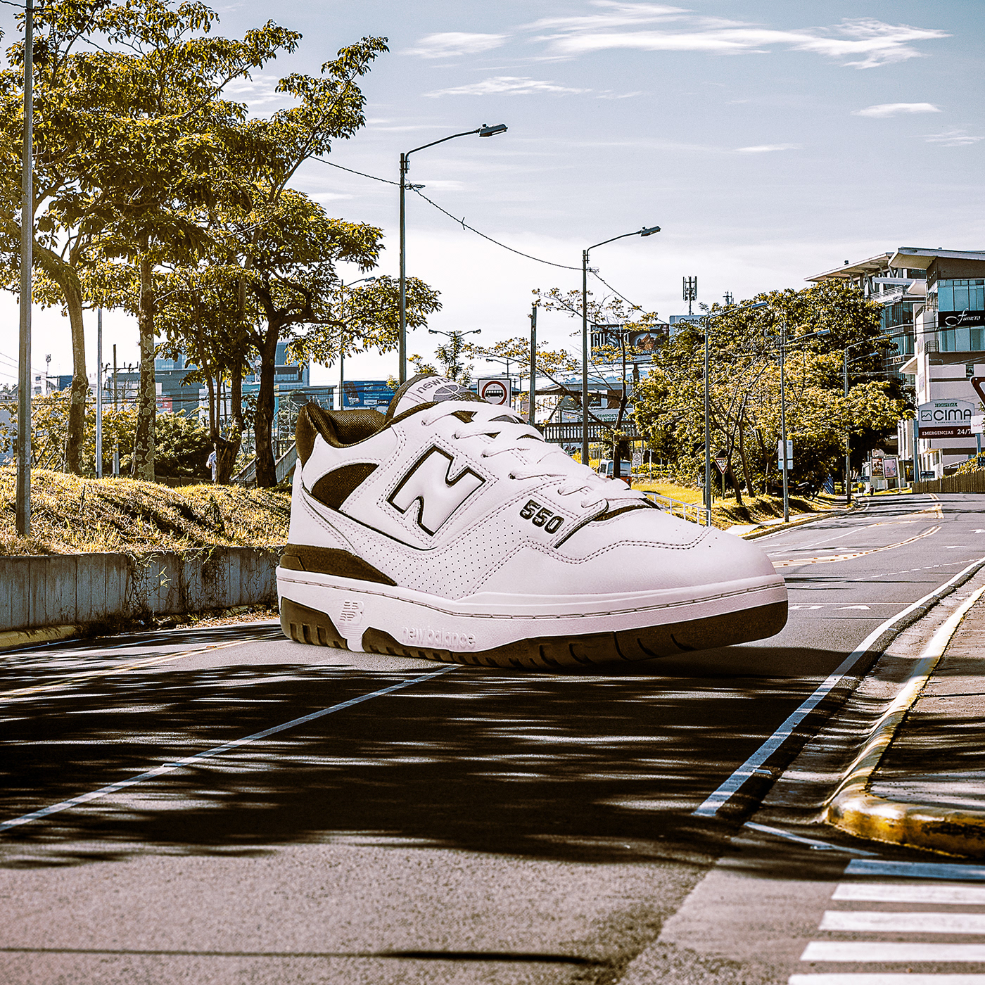 Photo composite of giant sneaker in nature. Retouching using Photoshop