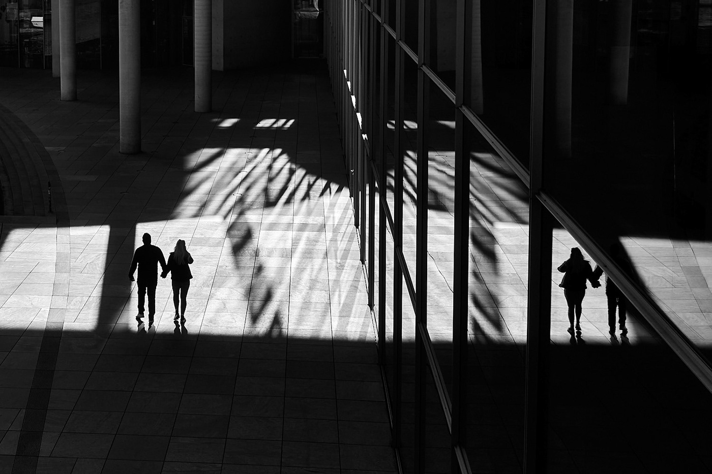 street photography black and white monochrome Urban architecture berlin Photography  leica q3 people light and shadow