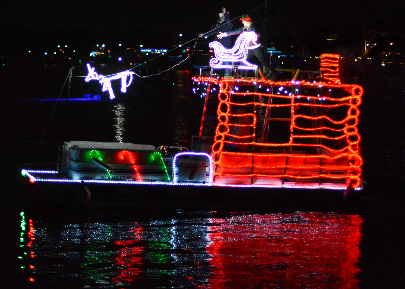 NC Holiday Flotilla Airlie Gardens Enchanted Airlie Zambelli fireworks Boat Parade Antique Auto Show Blockade Runner Resort wrightsville beach north carolina