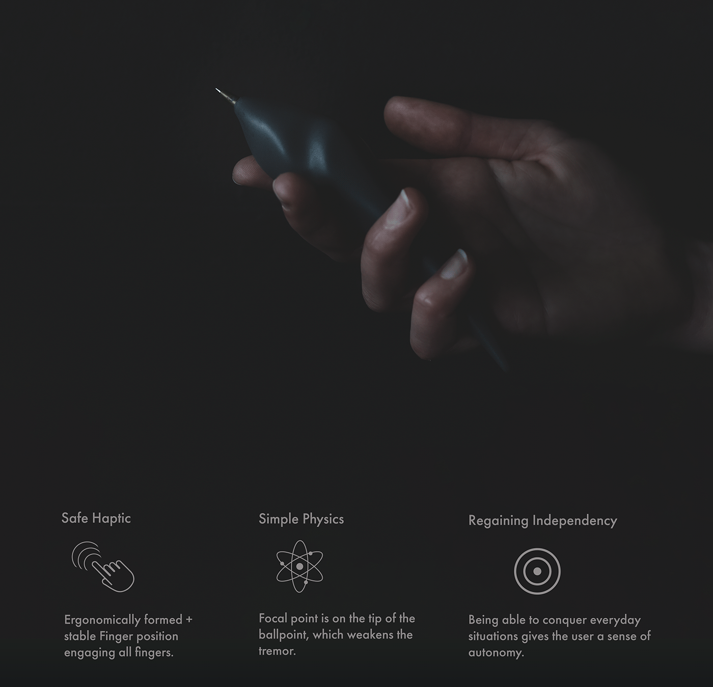 hand holding pen in the dark