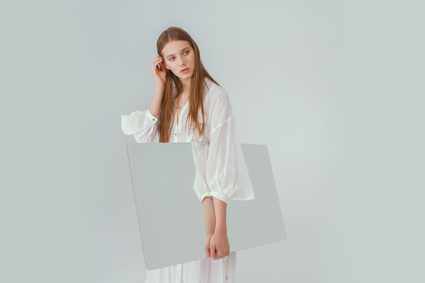 model White styling  minimal mirror reflection editorial shooting
