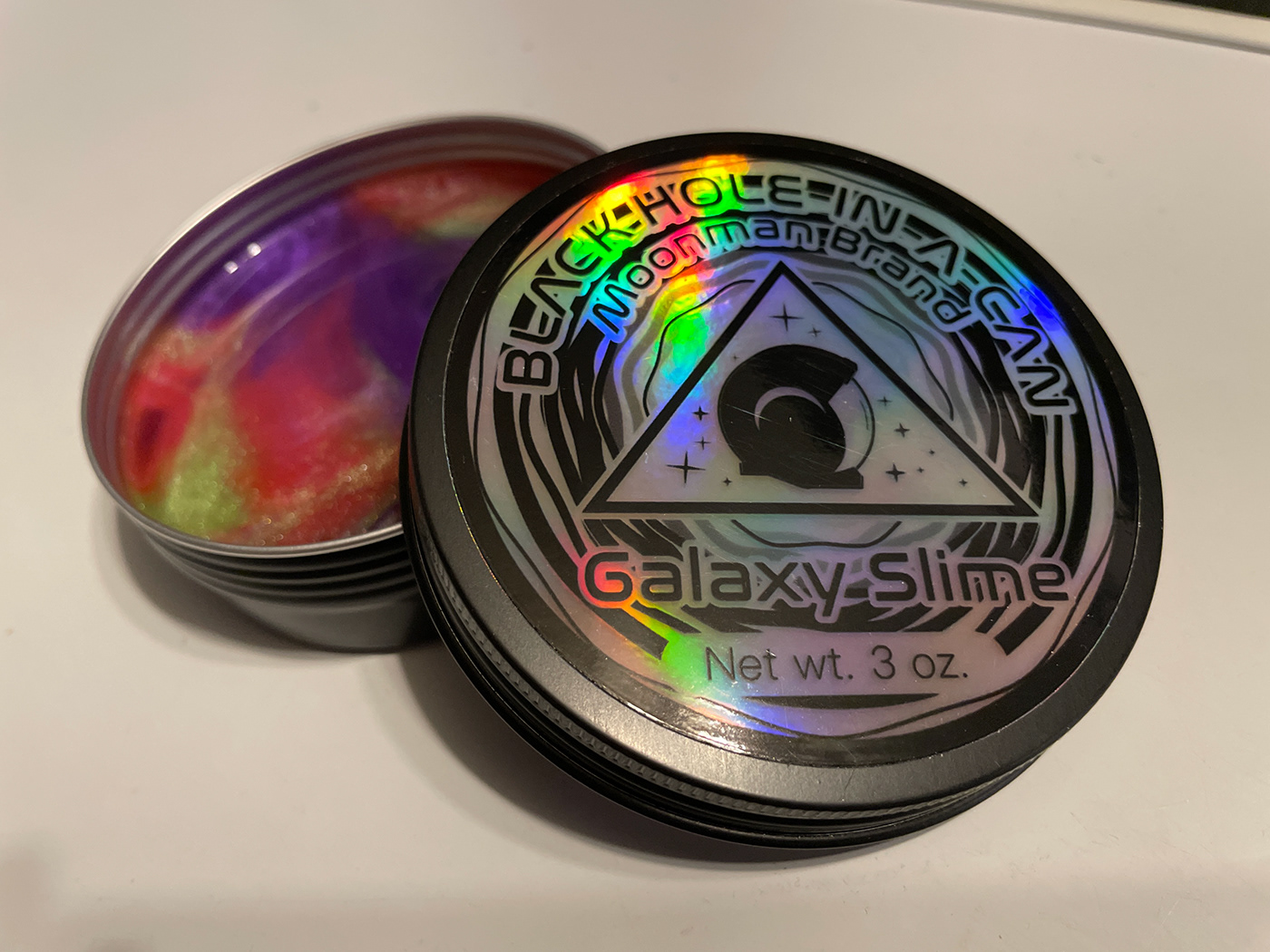 black hole galaxy holographic self directed slime sticker
