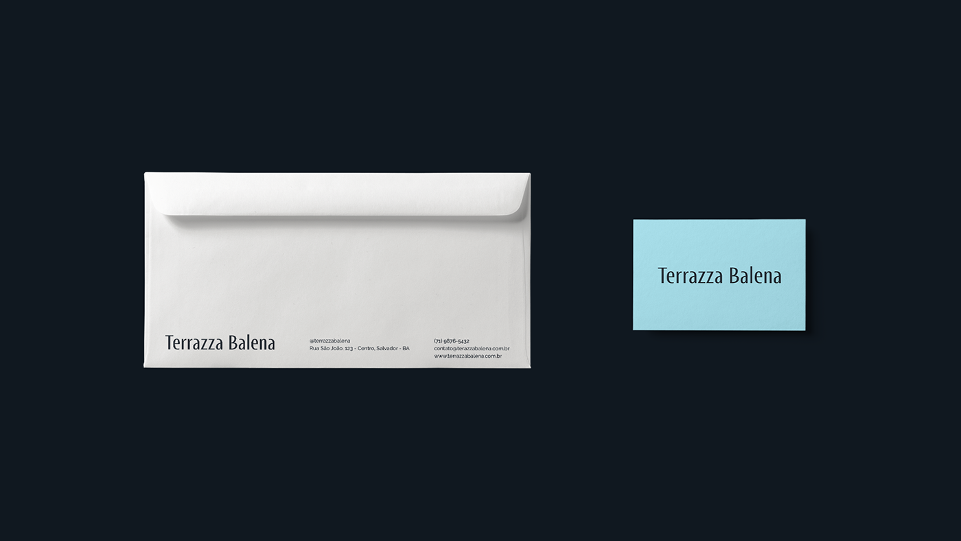Envelope and business card 'Terrazza Balena' with minimalist design on dark background.