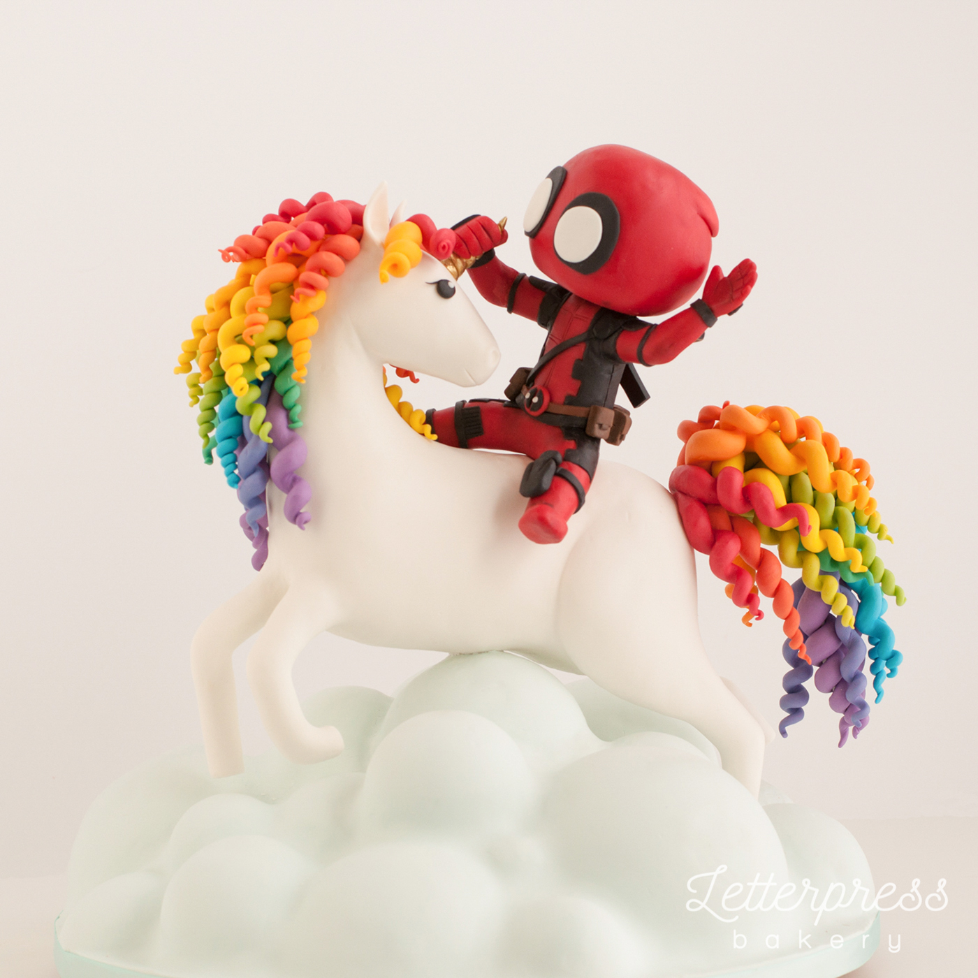 deadpool cake sculpting  rainbow modelling curly hair clouds unicorn horse marvel comic