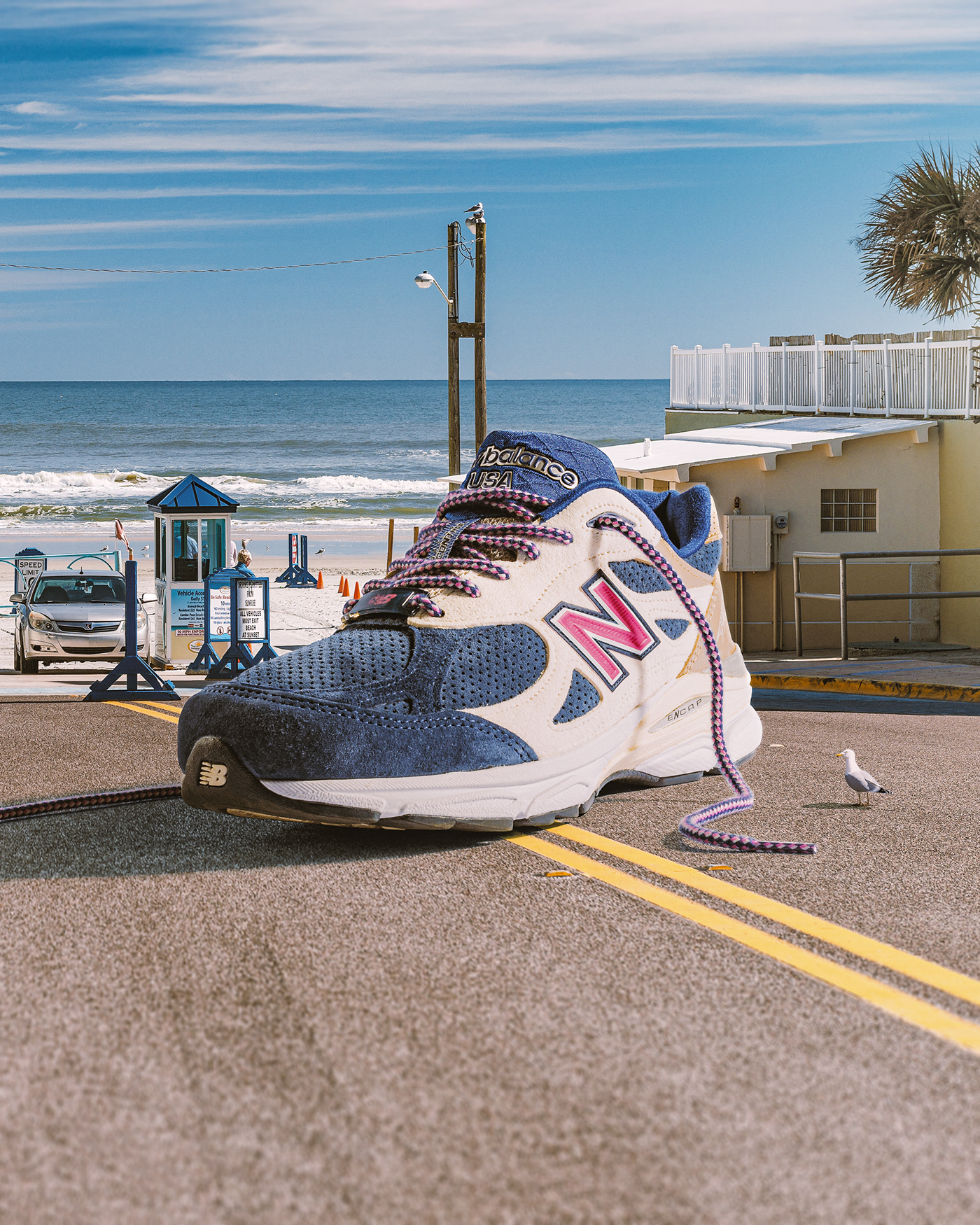 Giant sneaker photo composite at the beach . Retouching using Photoshop