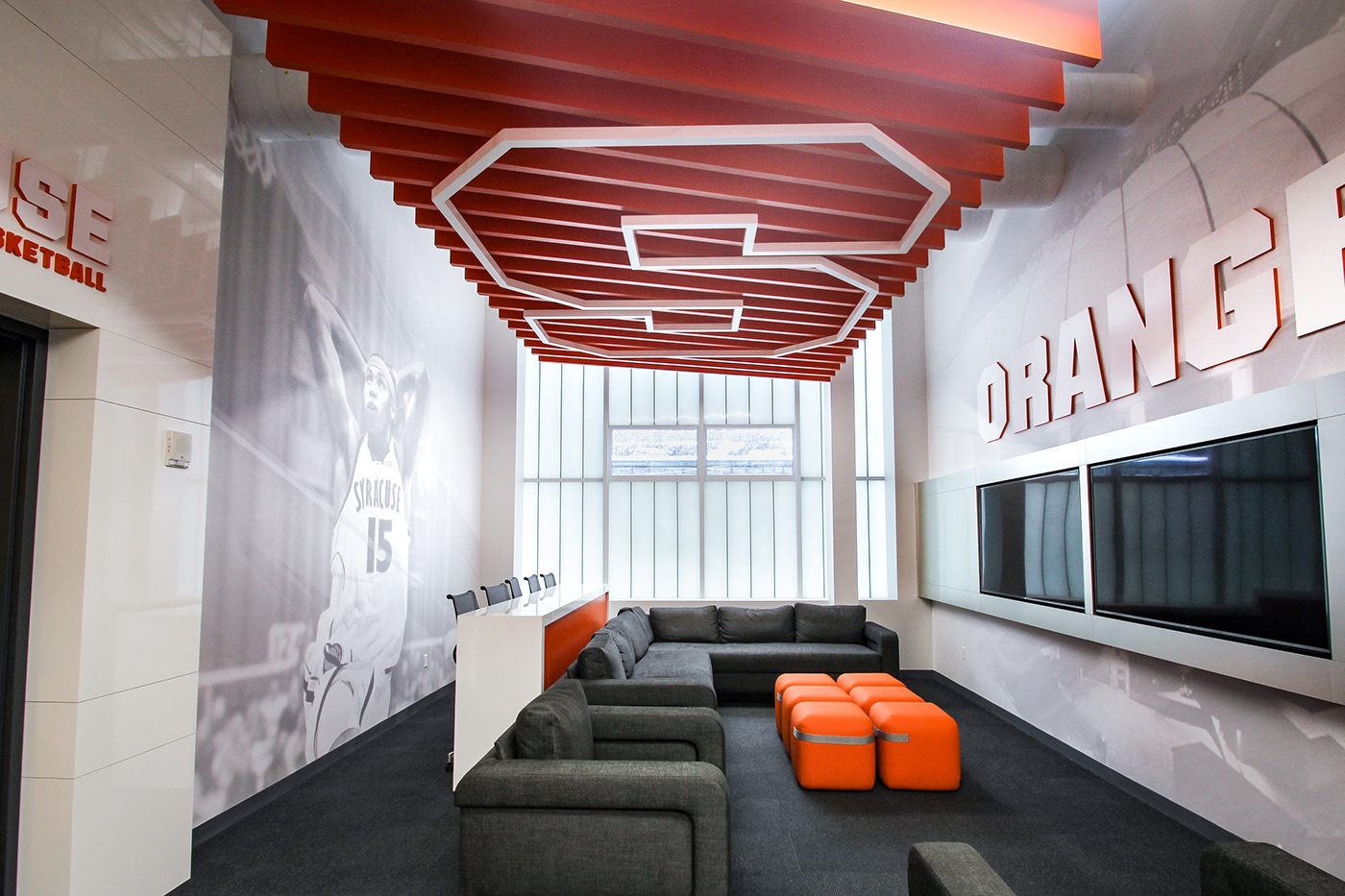 Syracuse University orange college basketball lounge environmental graphics Experiential design sports branding  interior design 