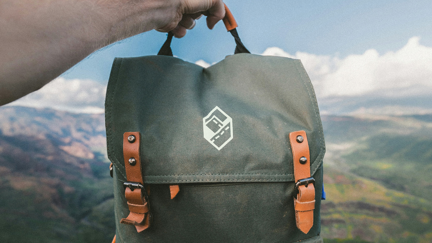 backpack with ExploreQuest Adventures logo