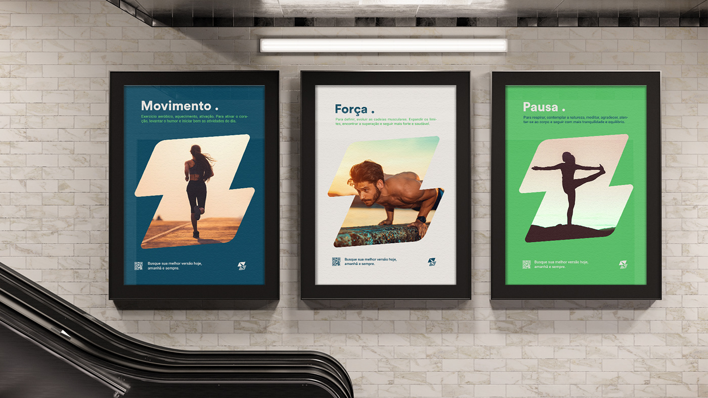 three posters with visual identity applied next to the subway escalator