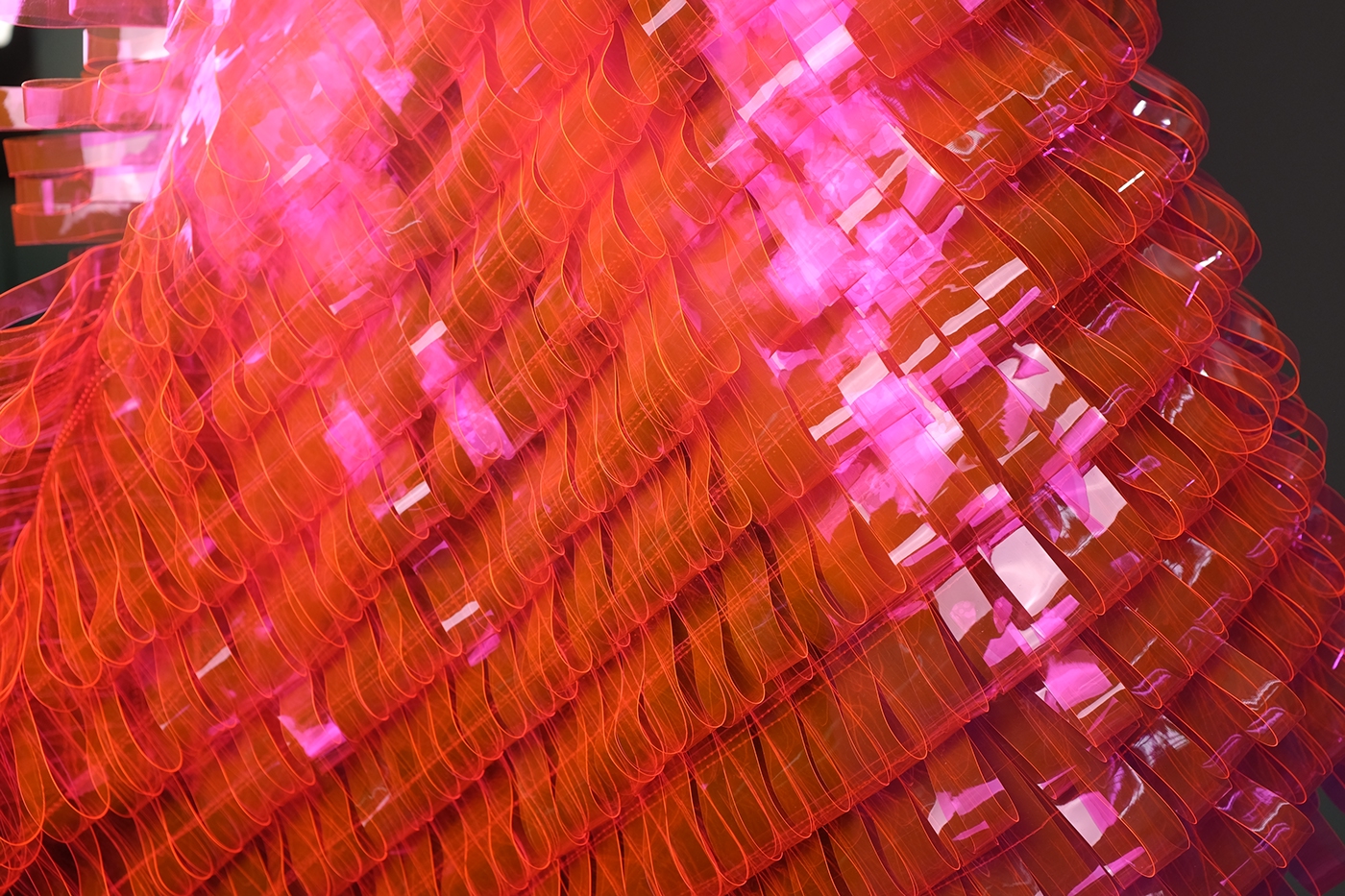 consumer culture vinyl hand manipulated fiber hot pink transparent textile loops Pleats ripple