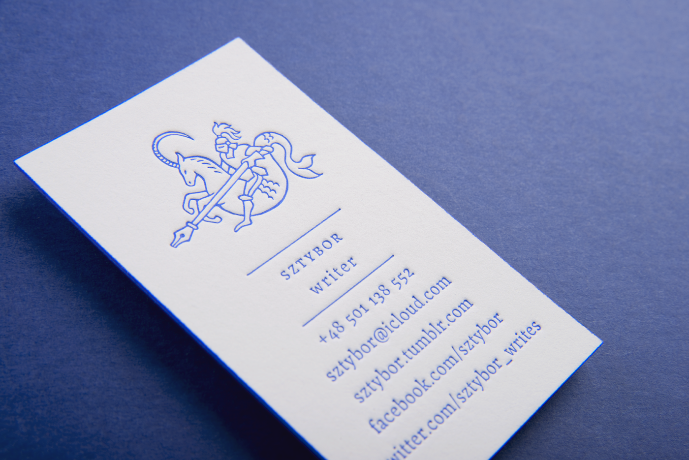 letterpress blue business card stamp identity polish design knight capricorn writer logo